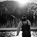 A Man Out Fly Fishing On A Winter Day