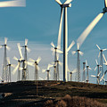 Windmills Dot The California Mountainside Near Mojave Desert